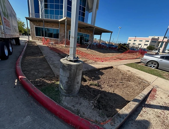 Concrete contractor working on a residential property in League City, TX