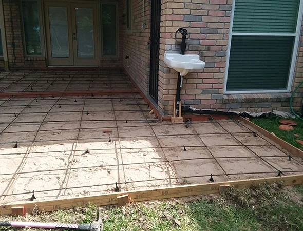 Concrete driveway replacement with a clean, finished surface at a Missouri City, TX home