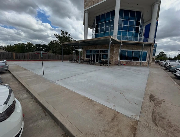 Concrete driveway installation at a West University home