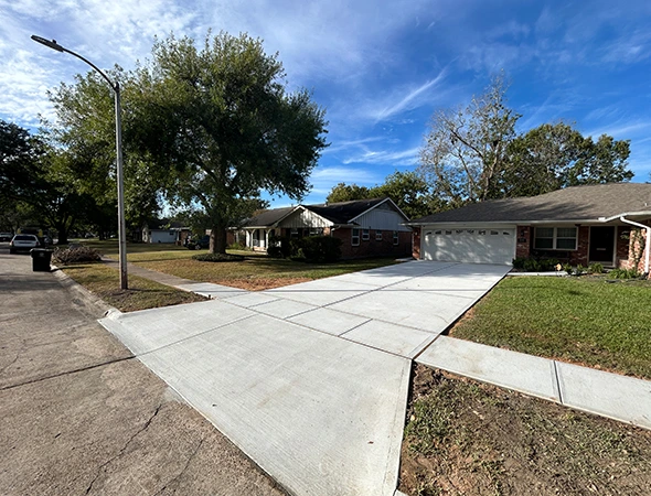 Residential concrete construction around an established West University property