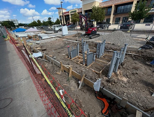Parking lot installation showing steel reinforcement and joint layout