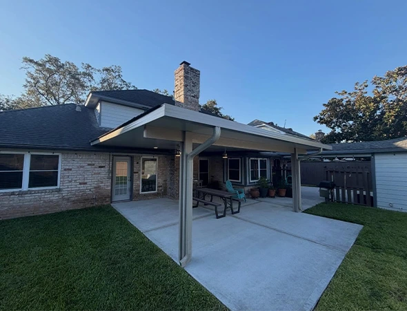 Solid-roof covered patio attached to a Houston home