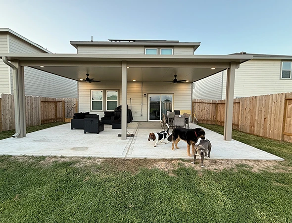 Freestanding wood pergola built for partial shade in a Houston yard